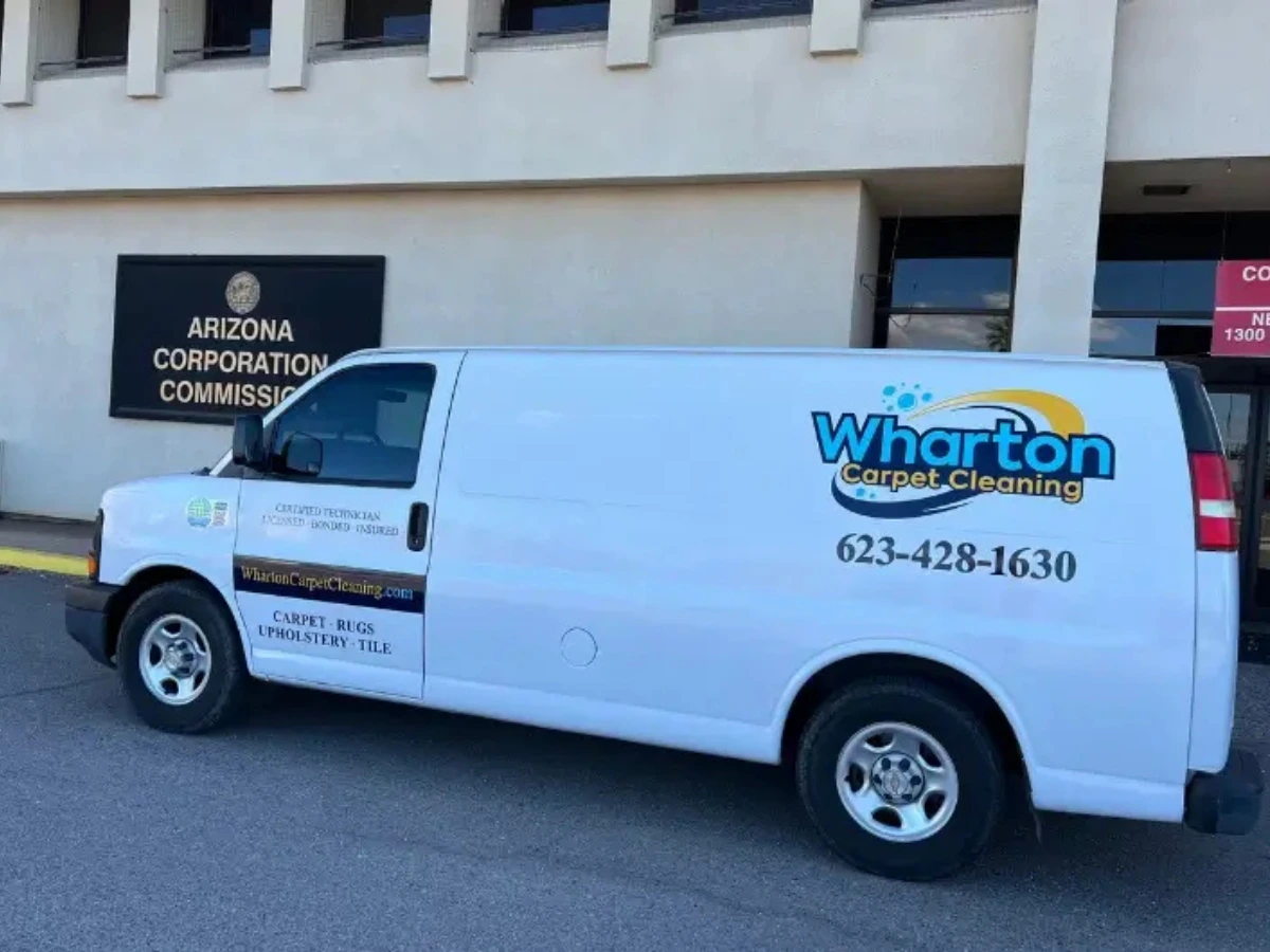 Wharton carpet cleaning work van parked in front of the Arizona Corporation Commission in Phoenix, AZ